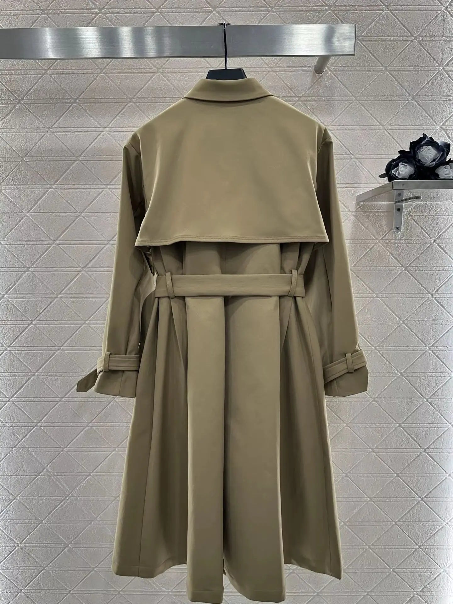 New early autumn women's European and American hooded hem flower bud lapel belt mid-length windbreaker British style long coat