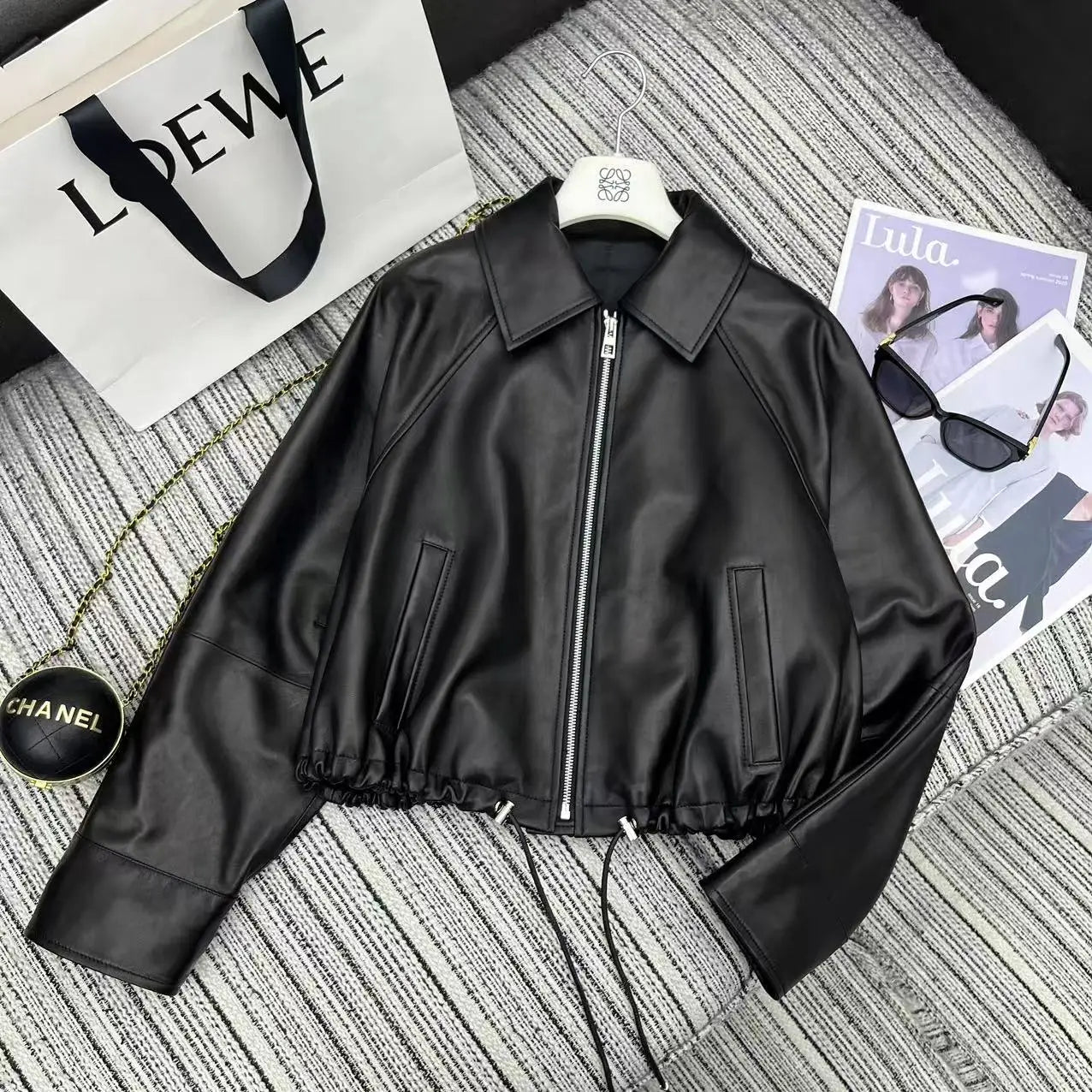 New black leather jacket for women in Spring 25 featuring zipper embroidery loose versatile sheepskin lapel genuine leather top