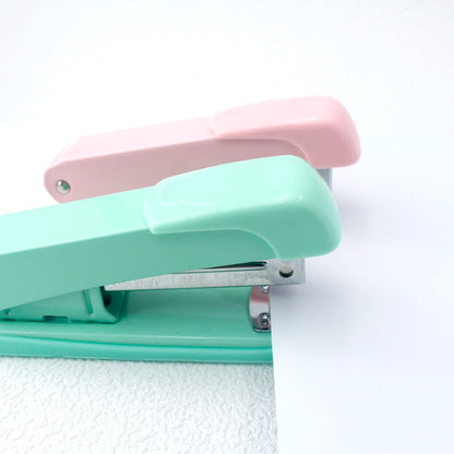 Stapler, staple remover, and staple set - a handy and stylish desktop stapler, perfect for home office use.