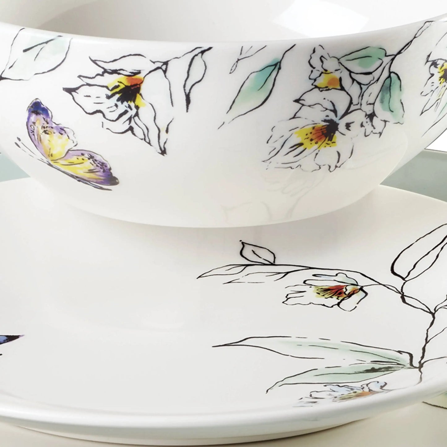 12-piece 4-person dinnerware set includes plates, bowls, cups, and durable cutlery for everyday dining and entertaining