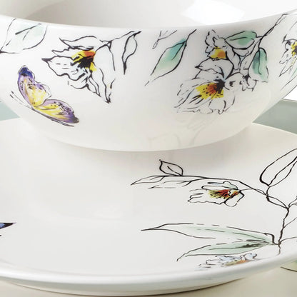 12-piece 4-person dinnerware set includes plates, bowls, cups, and durable cutlery for everyday dining and entertaining